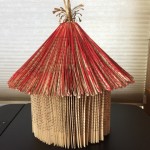  The paper tent was a table centerpiece at National Council of Jewish Women’s luncheon in Cleveland. It’s made out of a copy of The Red Tent -- about eleven inches tall including the tassel. Some friends have objected to the “destruction” of a book, but I love it. 